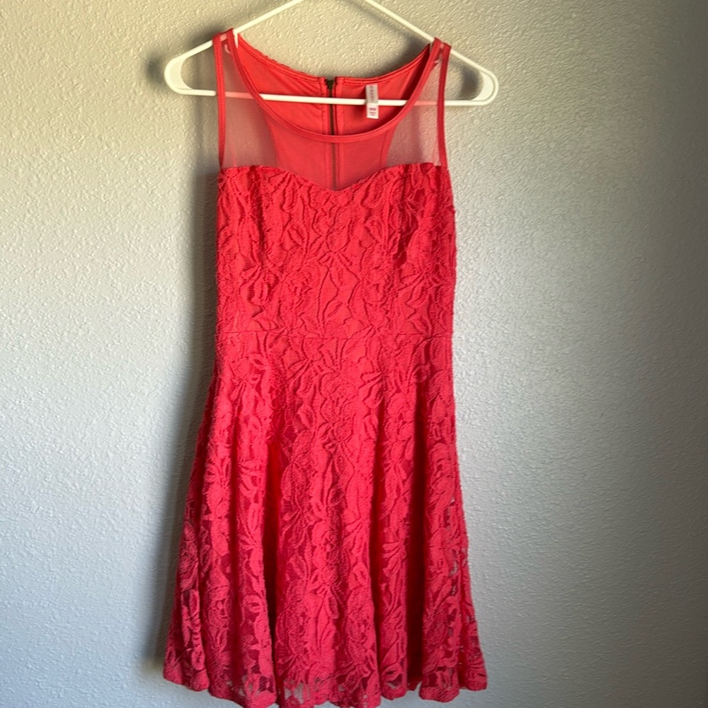 Pink mini dress size M. Razor back, sheer accent up top, floral design overlay.